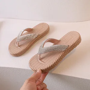 Elegant women's flip flops with rhinestone straps and straw weave textured soles