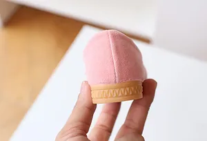 Detail of pink suede girl's shoe showing anti-slip rubber sole and fine stitching