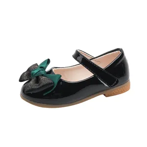 Meisjes Mary Jane schoenen van zwart lakleer met dubbele strik en rubberen zool