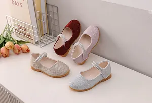 Detail of girls' sequin Mary Jane shoes with double rhinestone straps in four colors