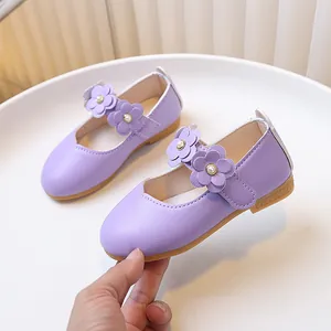 Purple girls Mary Jane shoes with 3D leather flowers and pearl accents on non-slip sole