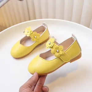 Yellow flower Mary Jane shoes for girls featuring soft faux leather and pearl accents
