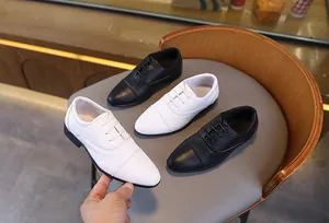 Détails de chaussures habillées rétro pour garçons en noir et blanc avec lacets élastiques