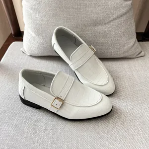 Classic white crocodile embossed loafers for boys with a stylish golden metal buckle
