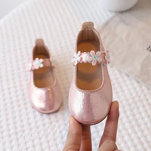 Sparkly pink girls Mary Jane princess shoes with three delicate 3D flower appliqués