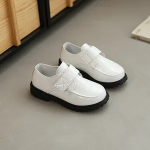 Boy's white patent leather crocodile loafers with non-slip thick rubber soles