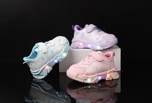 Detail of LED light-up soles and butterfly prints on girls' velcro sneakers in three colors