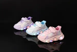 Three pairs of girls LED sneakers in purple, blue, and pink colors with heart prints