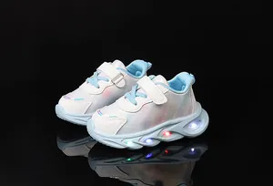 Detail of LED light-up sole on breathable girls' sneakers with heart prints