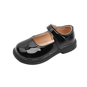 Classic girls black patent leather Mary Jane shoes with velcro strap and rubber sole