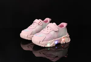 Scarpe sportive rosa con luci LED per bambine con fulmini laterali e chiusura a strappo