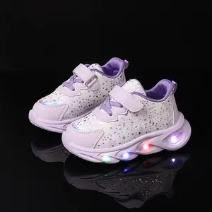 Kids purple light-up floral sneakers with LED soles and easy hook-and-loop closure