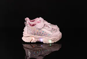Baskets roses pour tout-petits avec semelles LED lumineuses et imprimé nœud coloré