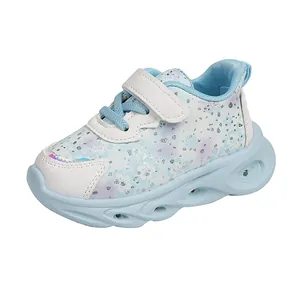 Girls floral LED light-up sneakers in blue and white with sequin details and velcro strap