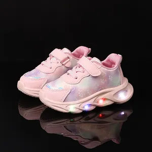 Pink LED light-up sneakers for girls with heart prints and rainbow gradient finish