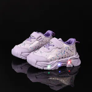 Baskets LED violettes pour enfants avec motifs papillon holographiques et semelles souples