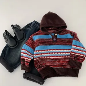 Detailed flat lay of children striped hooded sweater and navy fleece-lined jeans outfit