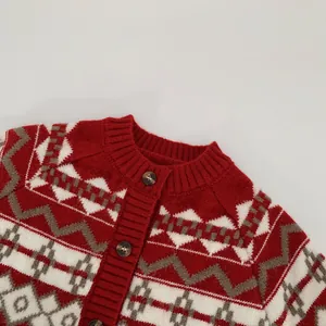 Close-up of Fair Isle pattern knit cardigan with round neck and brown buttons