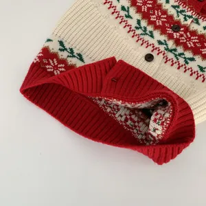 Toddler festive knit cardigan with snowflake pattern and ribbed cuffs in red and green