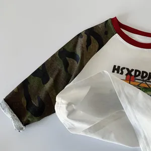 Kids long sleeve raglan t-shirt with camo sleeves and red crew neck in casual sport style