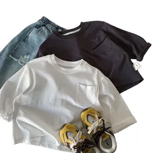 Boys white and grey long sleeve cotton t-shirts with ripped jeans and retro sneakers