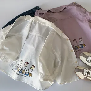 Detail view of cotton shirts showing back illustration and Monday Sleeping Club text