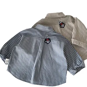 Kids long sleeve shirts in blue and brown stripes with unique patchwork design