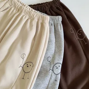 Détails du jogging en coton pour enfants avec taille élastique et broderie cartoon
