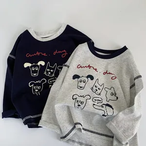 Close-up of contrast crew neck and cute cartoon dog prints on long sleeve kids t-shirts