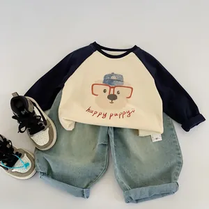 Kids long sleeve raglan T-shirt with puppy graphic and light blue denim jeans set