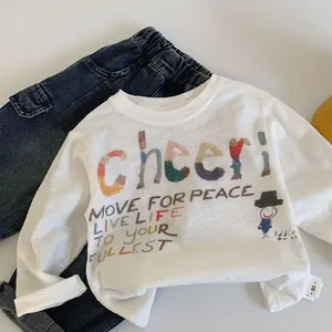 Kids long sleeve white T-shirt with rainbow print and blue jeans casual set