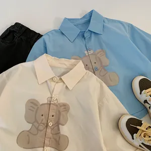 Kids short sleeve shirt featuring cute cartoon elephant print with classic lapel design
