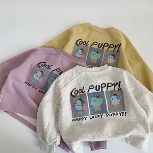 Toddler crewneck sweatshirts in yellow, purple, and grey with cute puppy prints