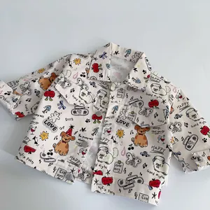 Kids long sleeve denim jacket featuring colorful cartoon prints and front pockets