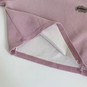 Pinkish purple crewneck sweatshirt with BABYSKY print and quality hem stitching detail
