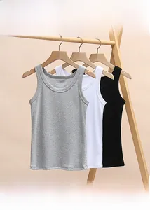 Detailed rib-knit texture and reinforced seams on three-piece cotton racerback tank tops