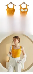 Detail view of ginger yellow ribbed cotton camisole with built-in removable pads