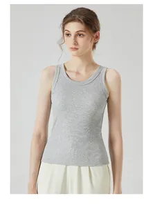 Close-up of gray ribbed cotton racerback tank top showing texture and slim fit design