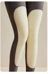 Détails des genouillères blanches avec coutures ondulées sur legging thermique