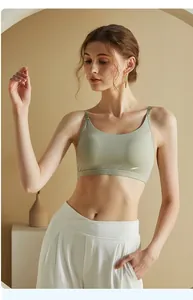 Close-up of seamless V-neck cooling camisole in sage green with thin shoulder straps