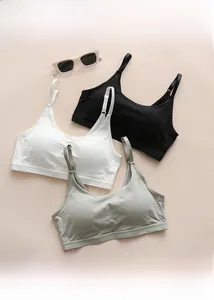 Three-color camisole set in black, white, and green with thin straps and elastic hem