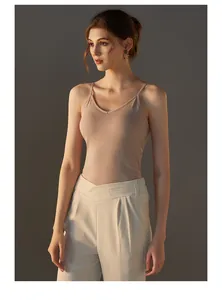 Detail of slim fit modal camisole with thin straps and V-neck in nude color