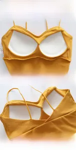 Detail of yellow camisole with integrated cups and elegant V-shaped back design