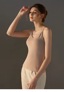 Detailed side view of slim fit modal camisole with built-in padding in nude pink