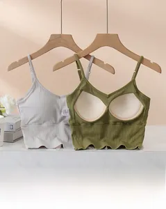 Detail of ribbed seamless camisole featuring built-in pads and V-neckline texture