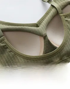 Close-up of grass green ribbed camisole showing U-shaped back and seamless stitching