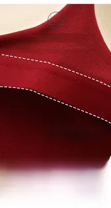 Detail view of breathable honeycomb lining and 2cm wide hem on dark red ribbed crop top