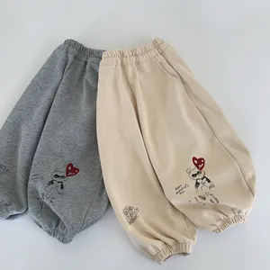 Pantalons de jogging amples pour enfants en gris et beige avec imprimé ours et taille élastique