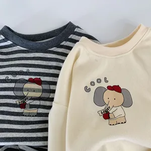 Detail of cotton kids long sleeve tees with cute cartoon elephant prints and cool letters