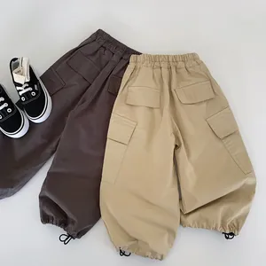 Boys casual cargo pants with elastic waist and drawstring hem in khaki and dark grey